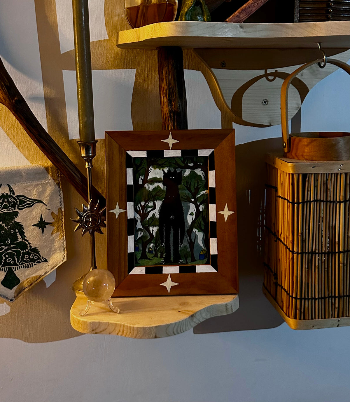 Hand-painted ‘unknown creature’ in hand-painted frame.
