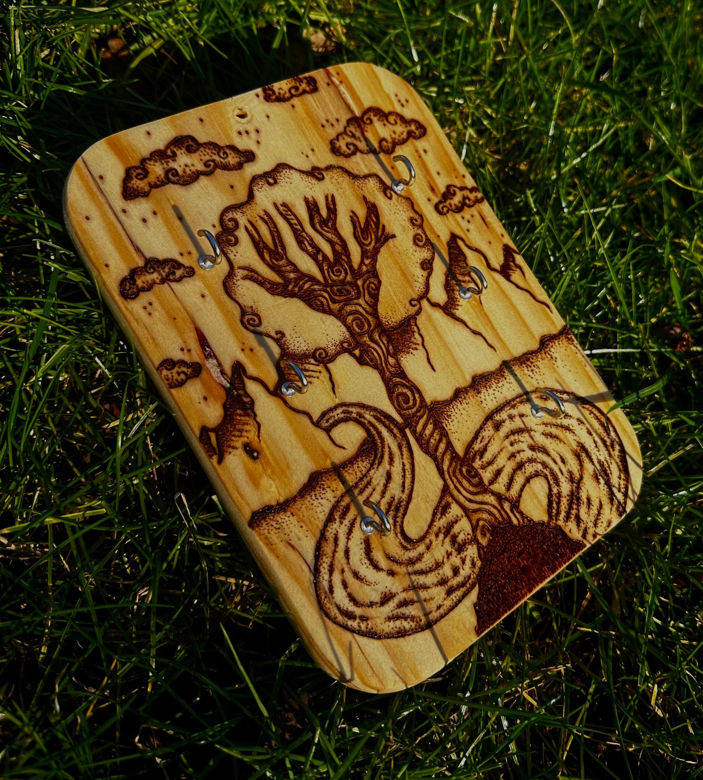 Whimsical wood art accessory holder.