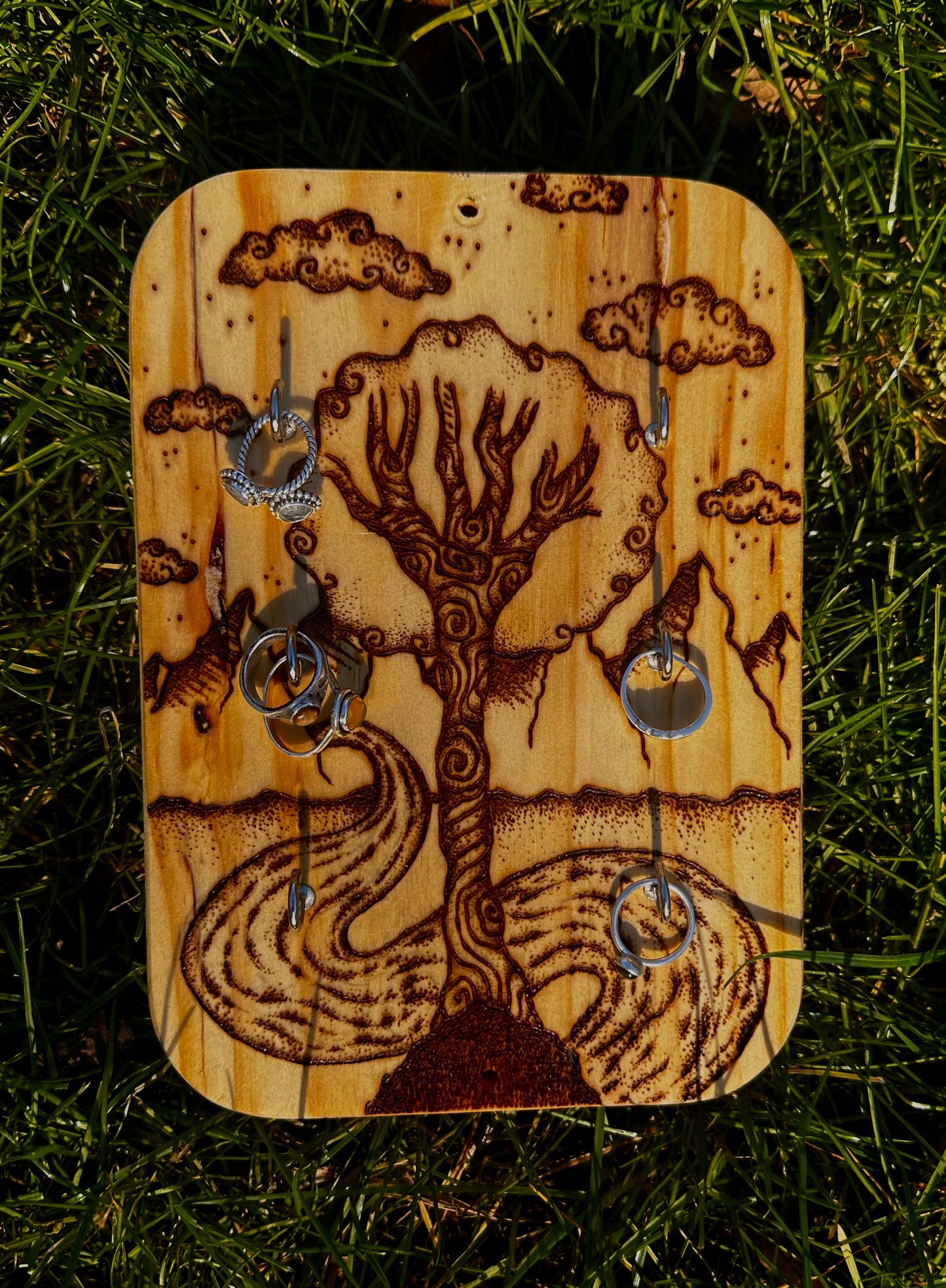 Whimsical wood art accessory holder.