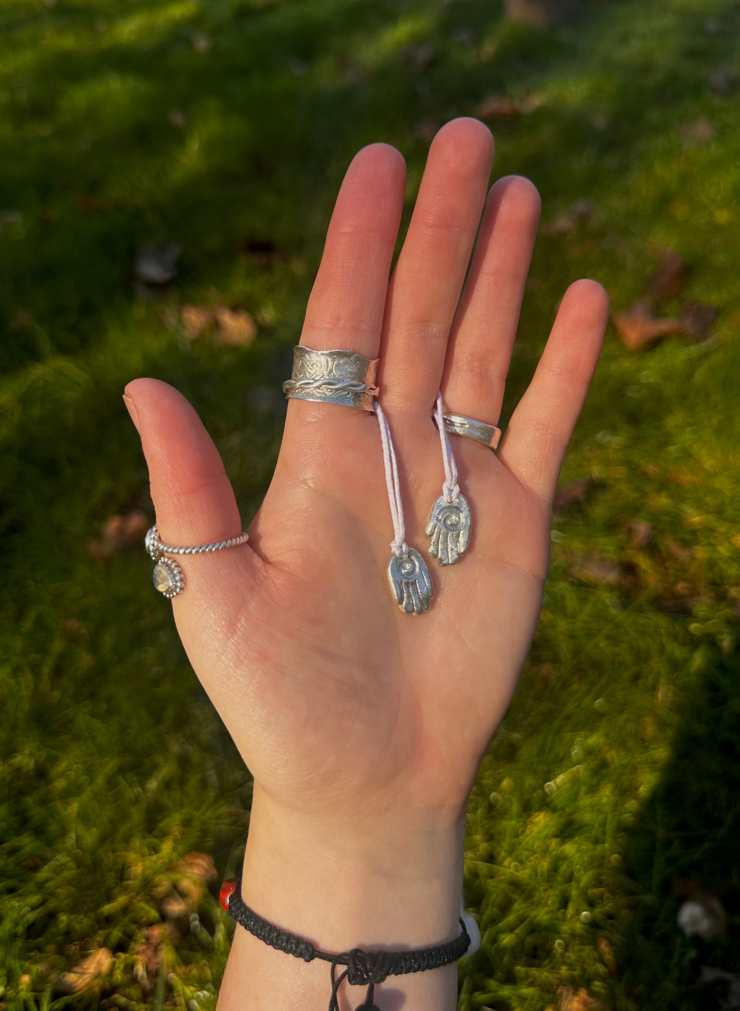 Sterling silver healing hand pendant necklace.