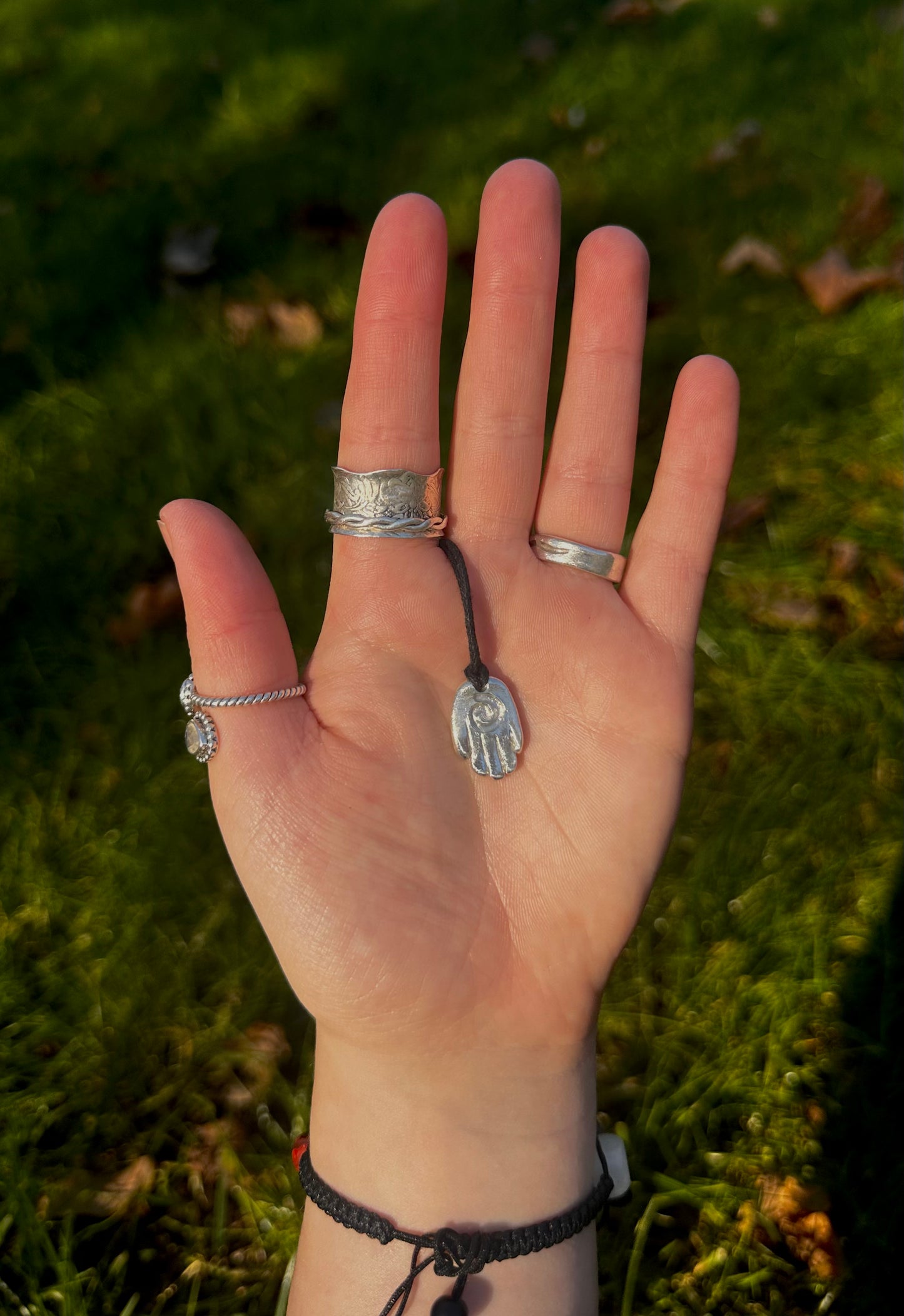 Sterling silver healing hand pendant necklace.