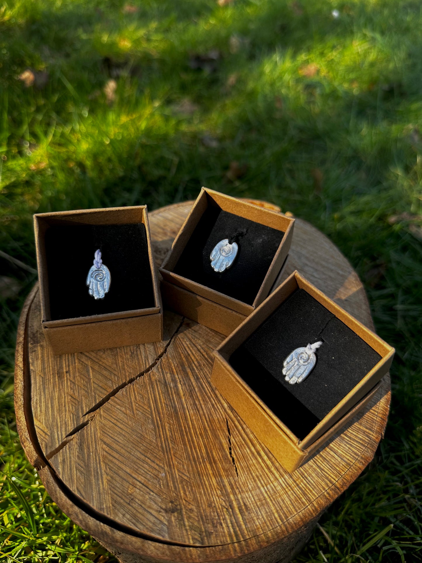 Sterling silver healing hand pendant necklace.