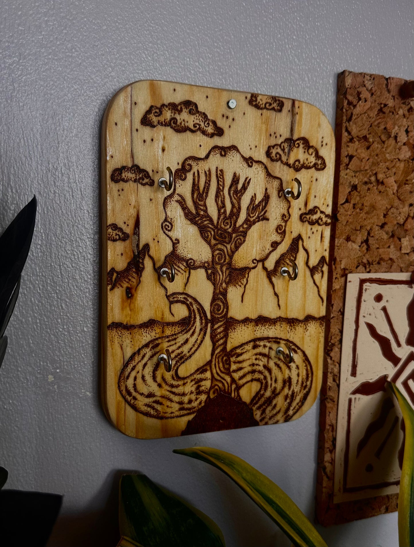 Whimsical wood art accessory holder.