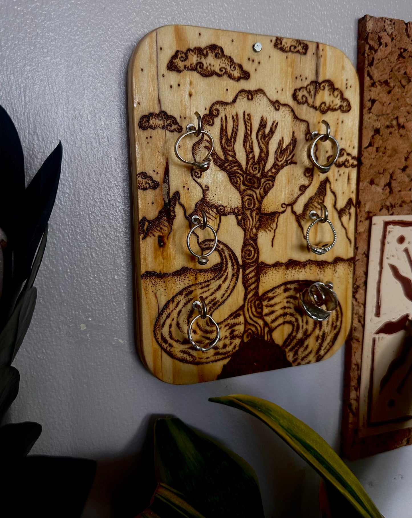 Whimsical wood art accessory holder.