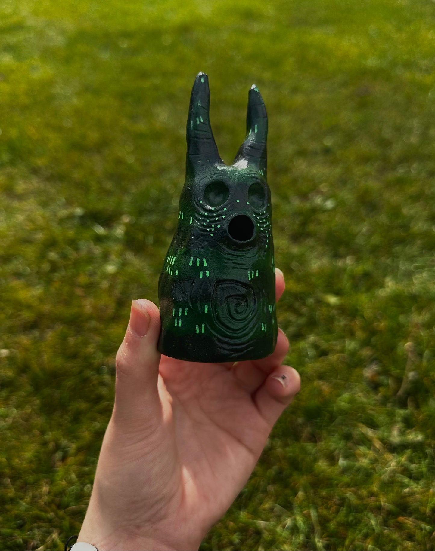 The exhales incense cone cover.