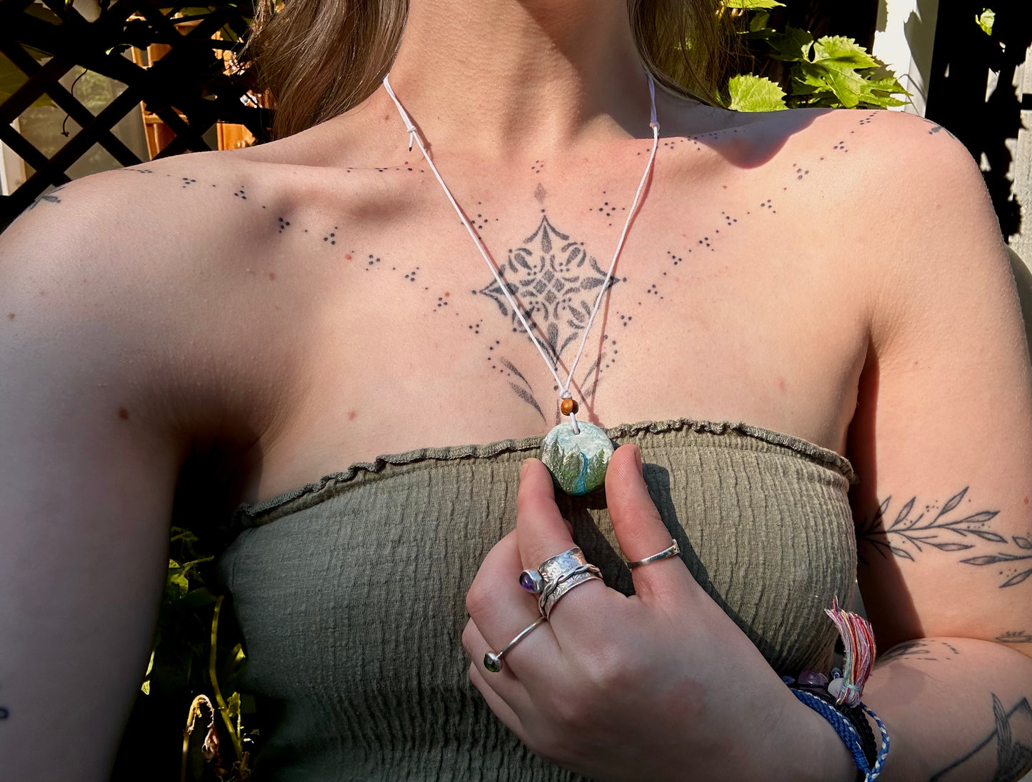 Mountain pendant necklace.