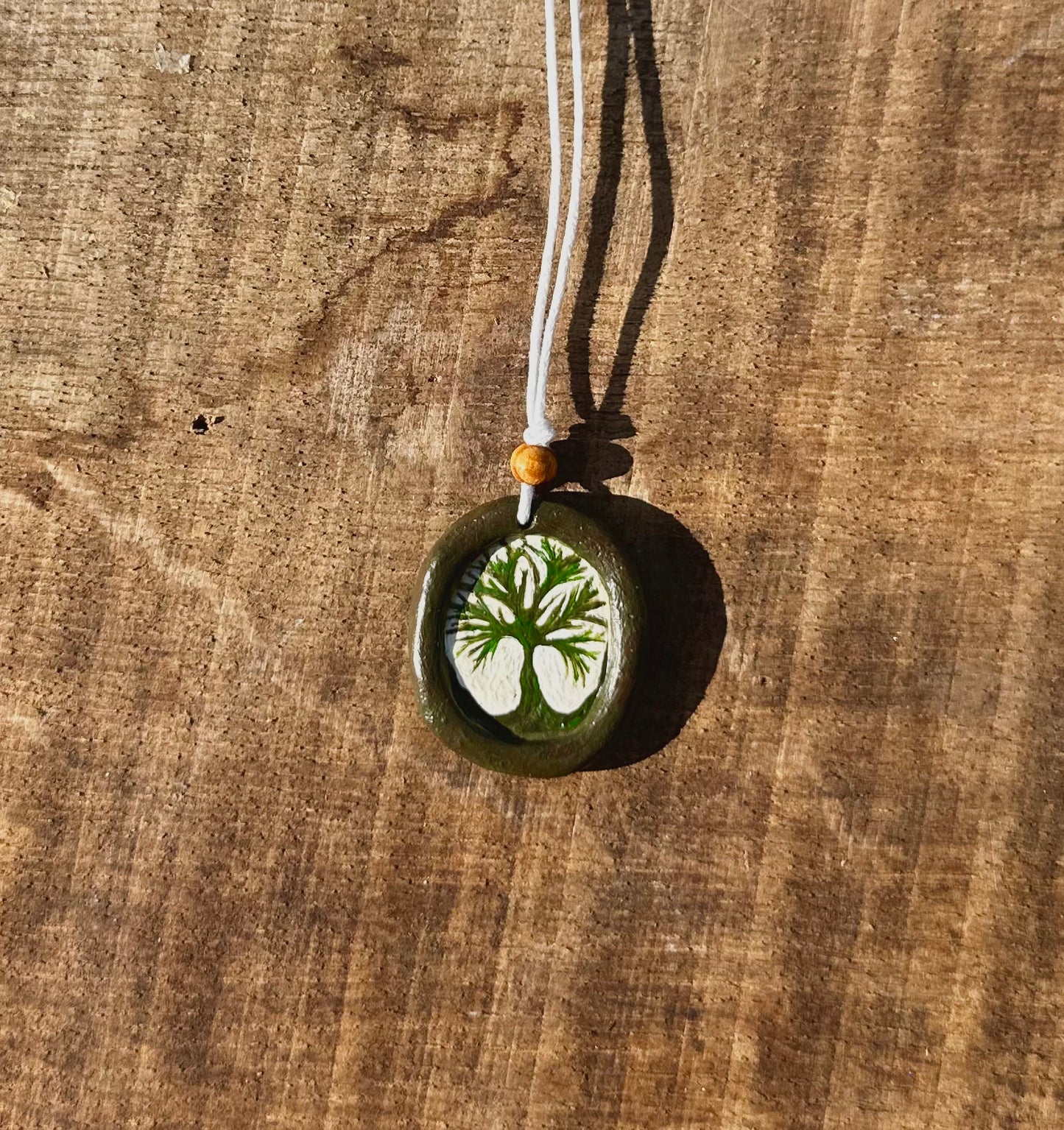 Framed Tree pendant necklace.