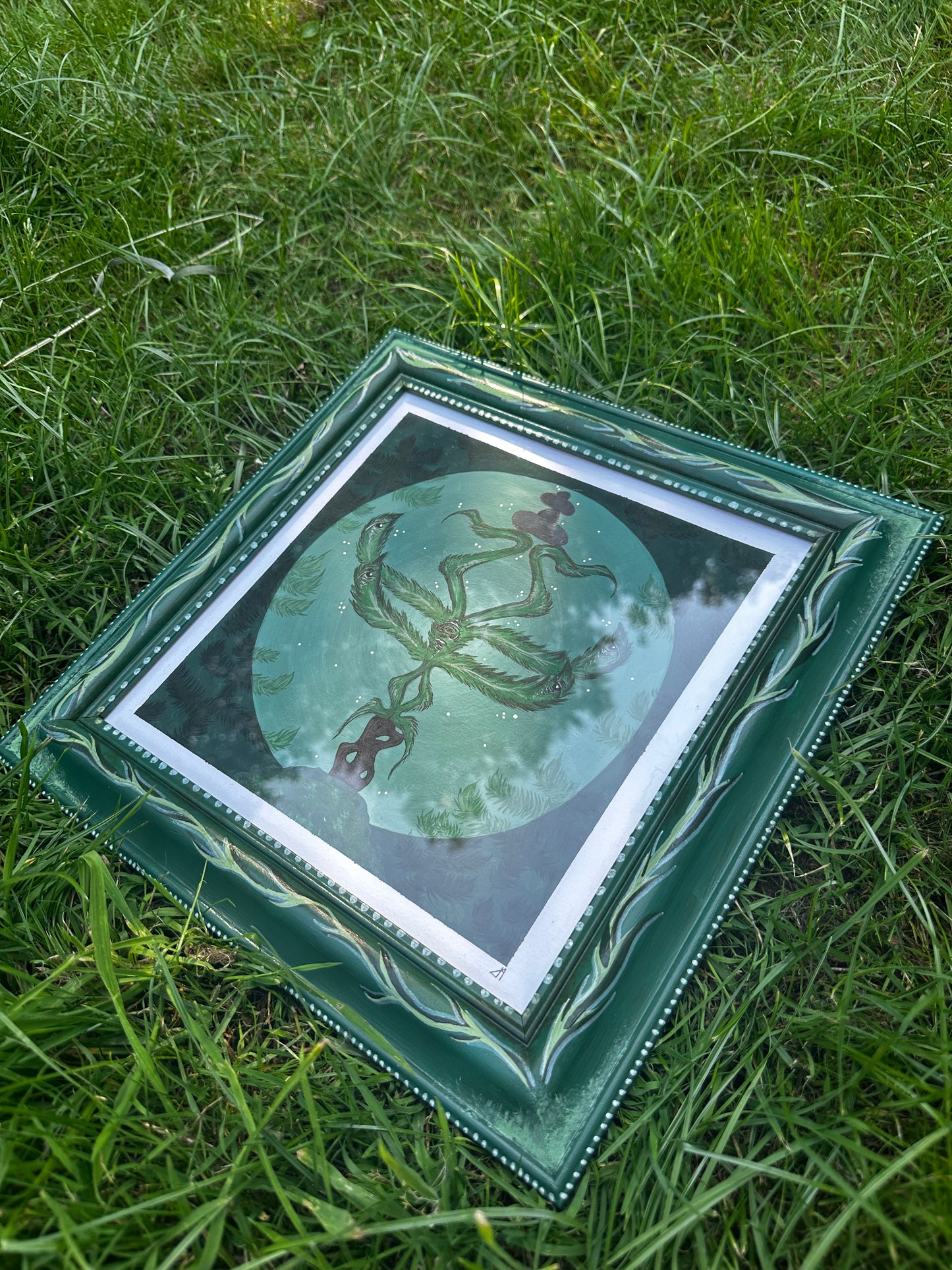 Fern face painting and up-cycled frame.