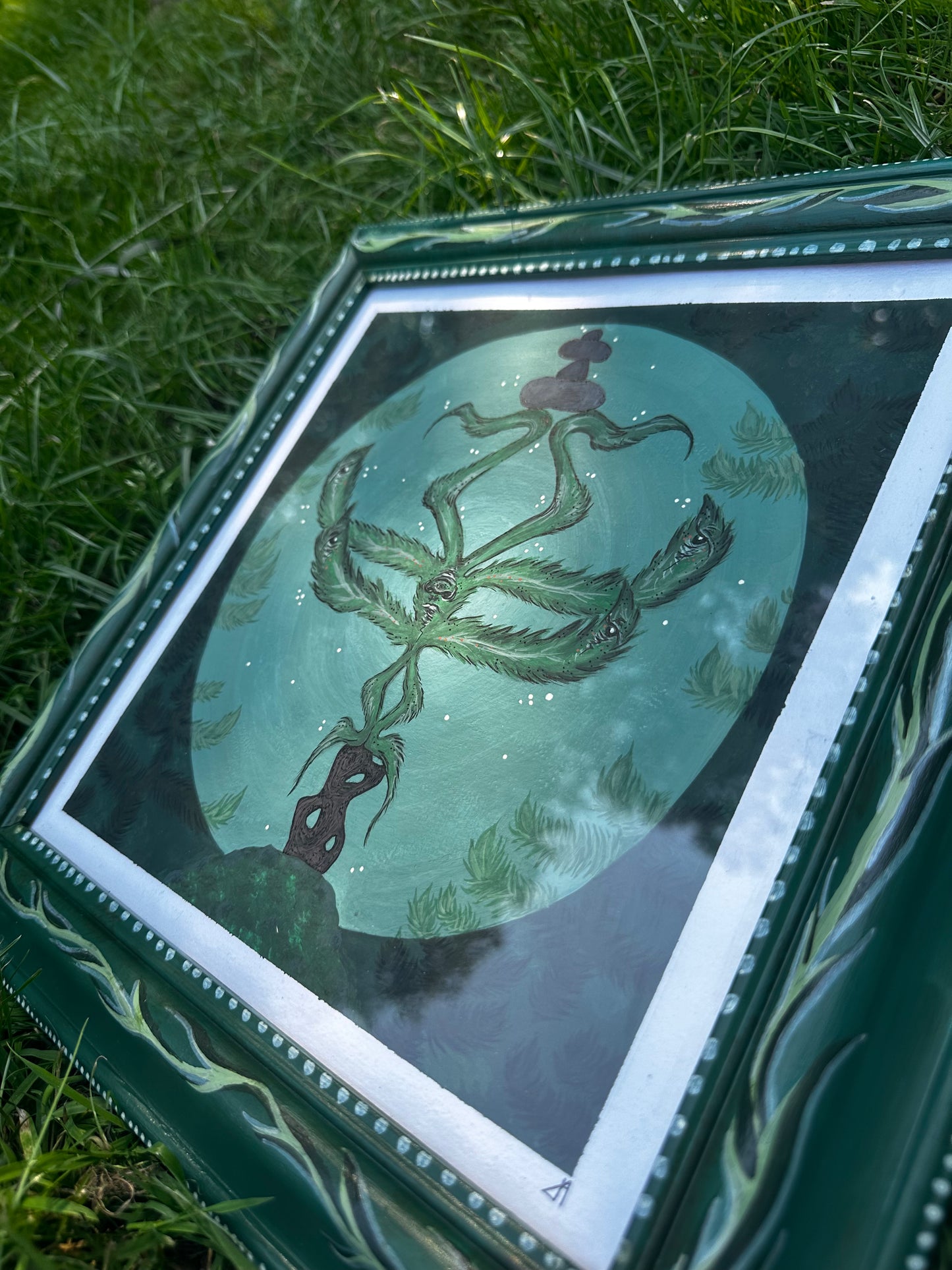 Fern face painting and up-cycled frame.