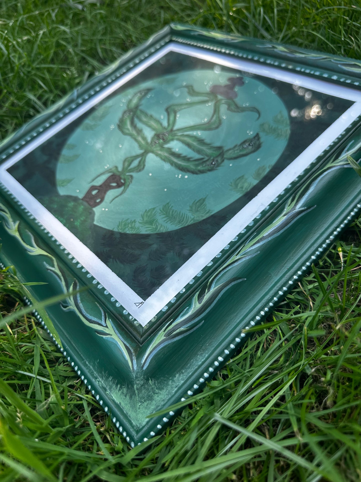 Fern face painting and up-cycled frame.