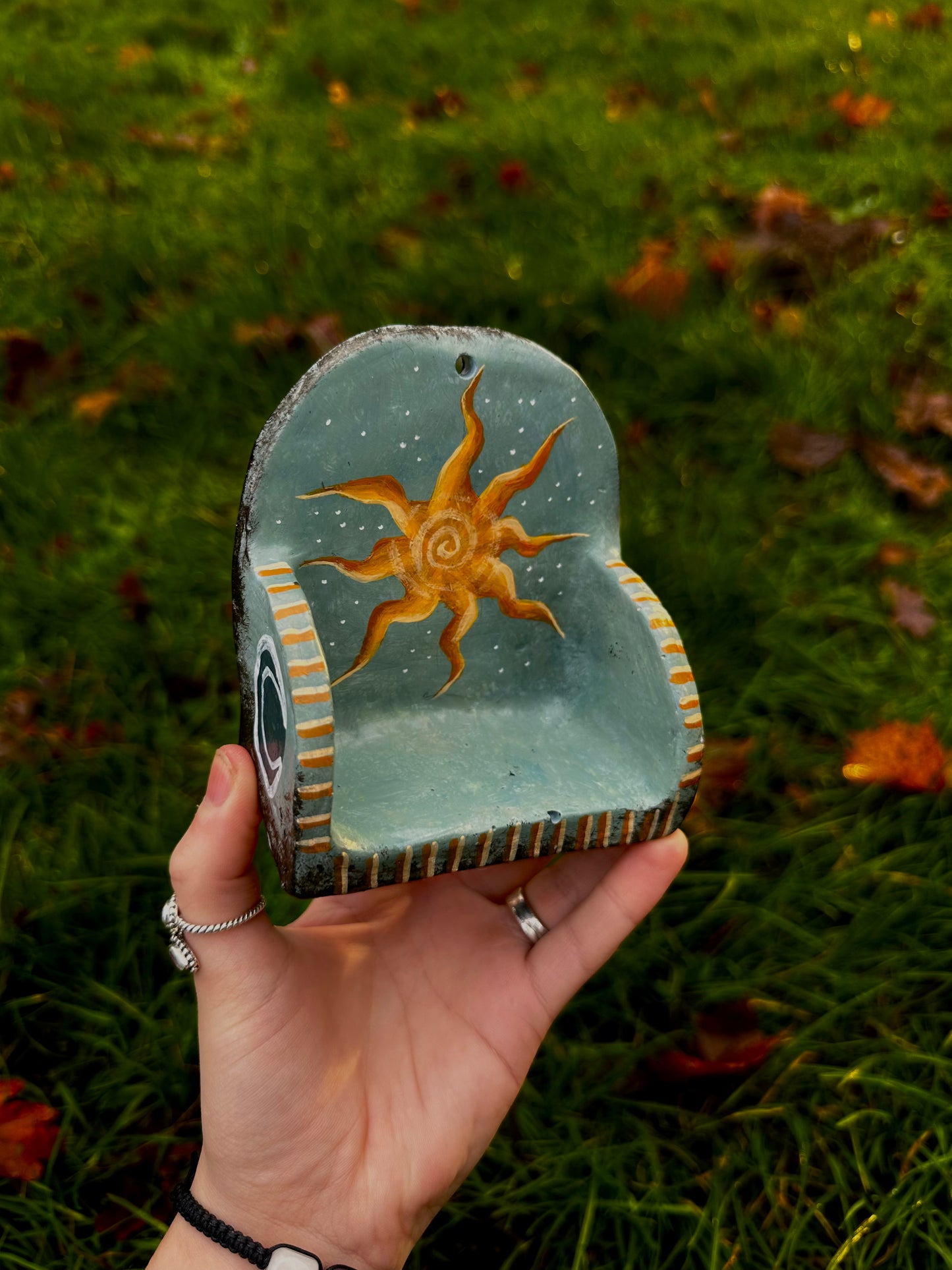 Whimsical mini wall shelf.