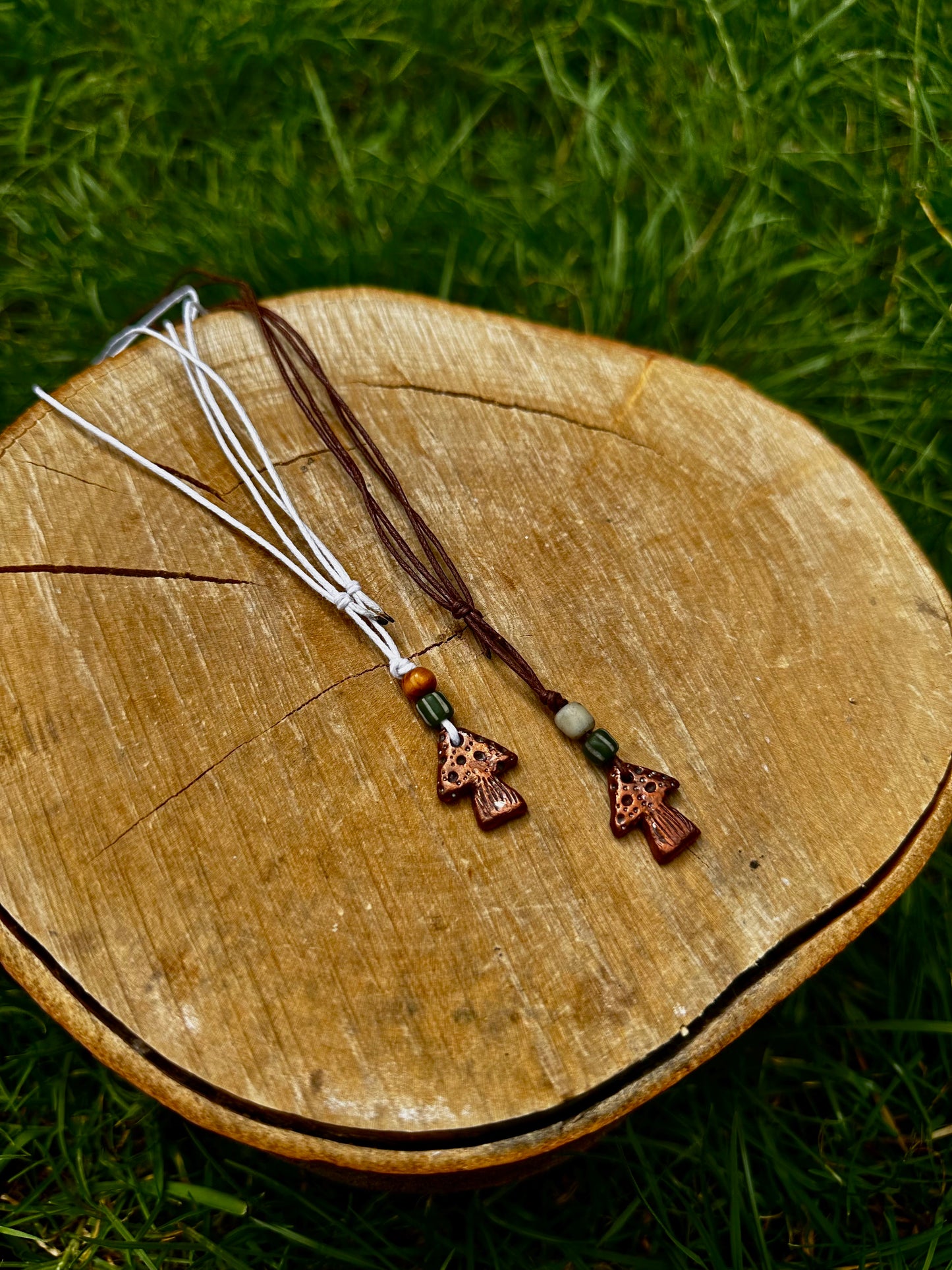Copper mushroom pendant necklace.