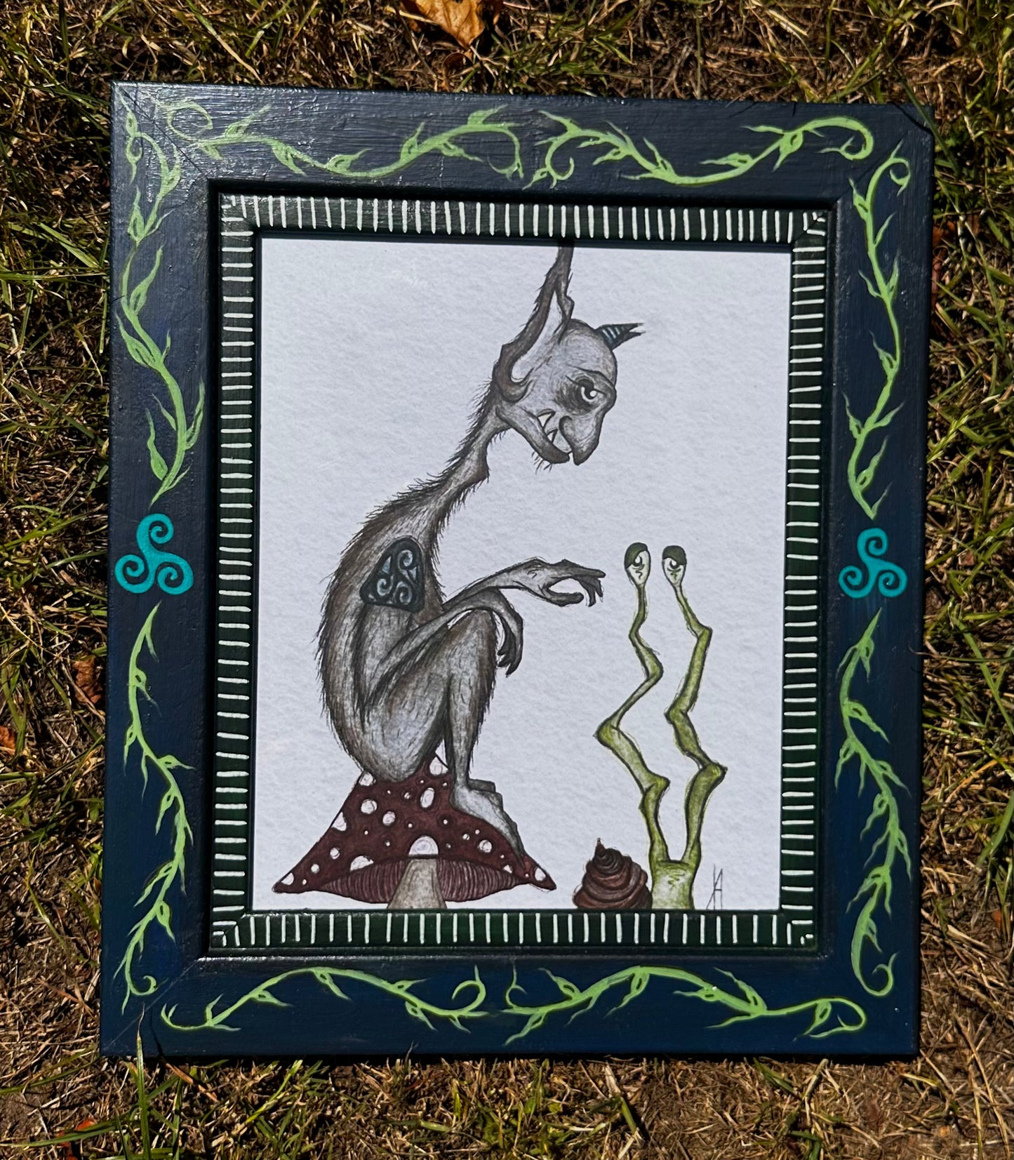Creature print in painted pre-loved frame.