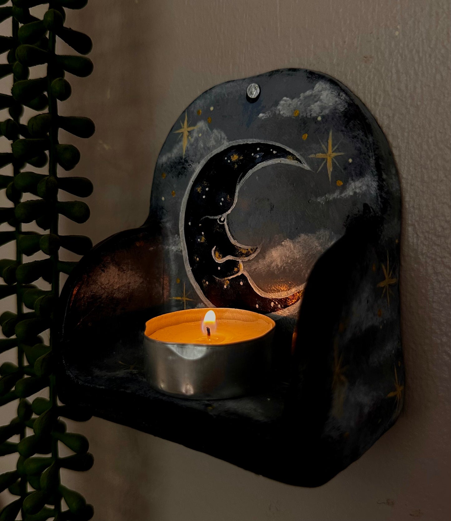 Whimsical mini wall shelf.