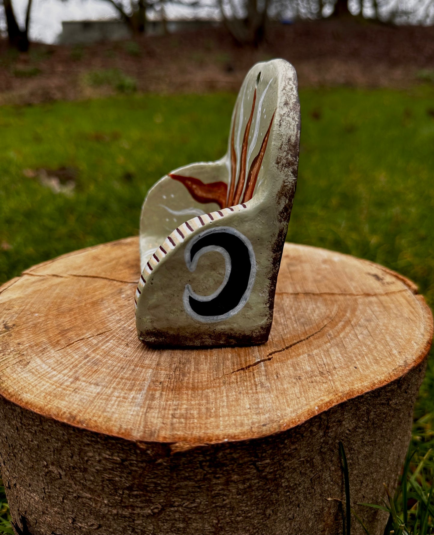 Whimsical mini wall shelf.