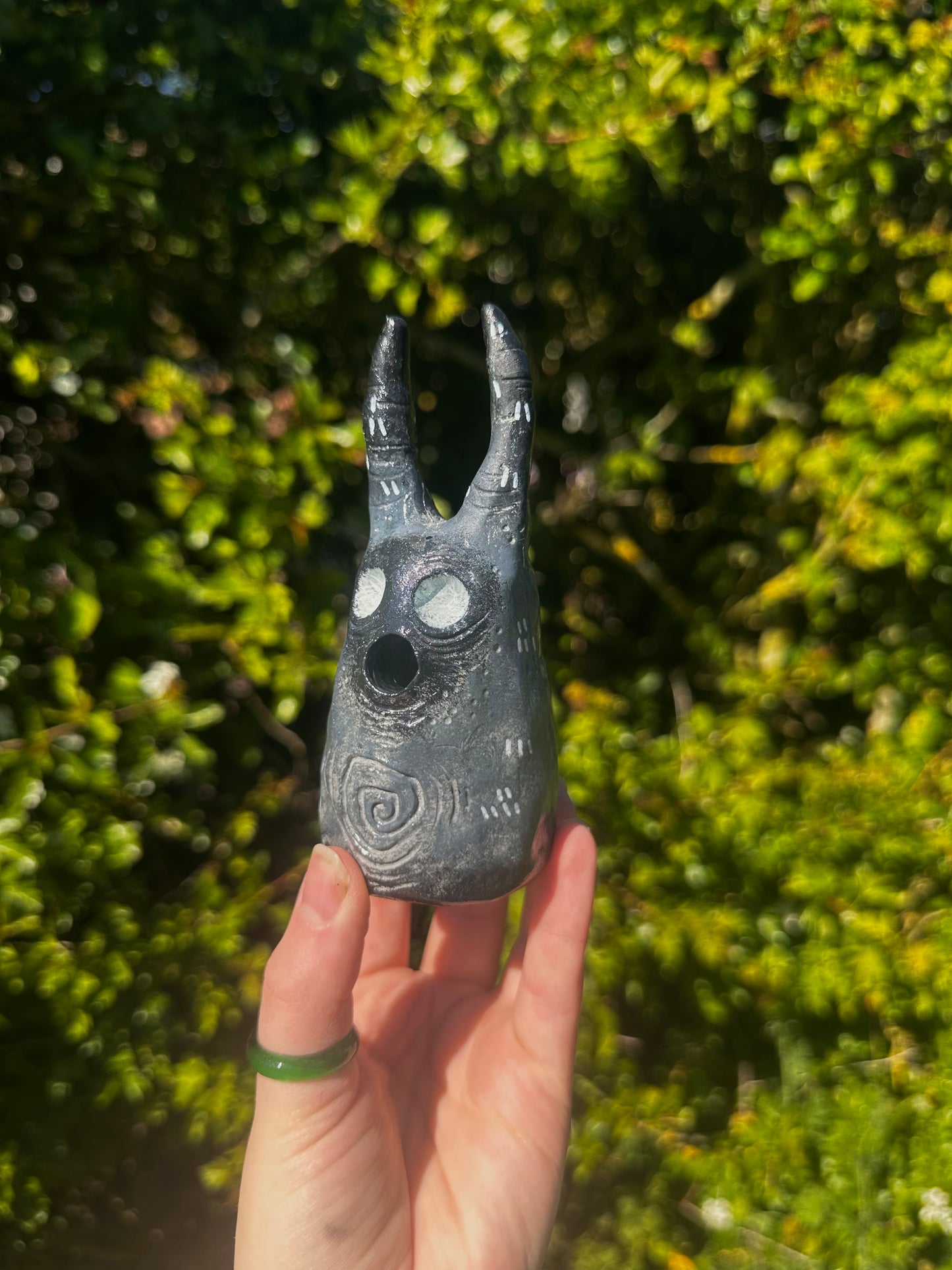 The exhales incense cone cover.