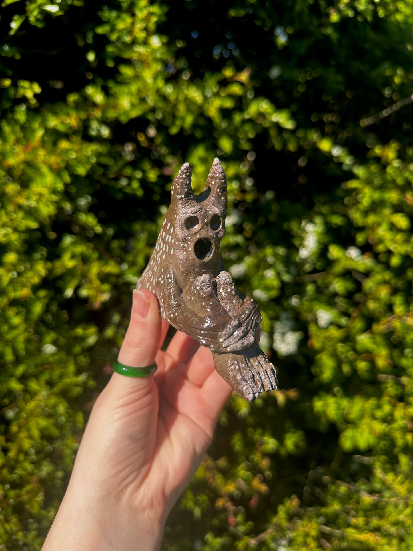 The pondering exhales, incense creature.
