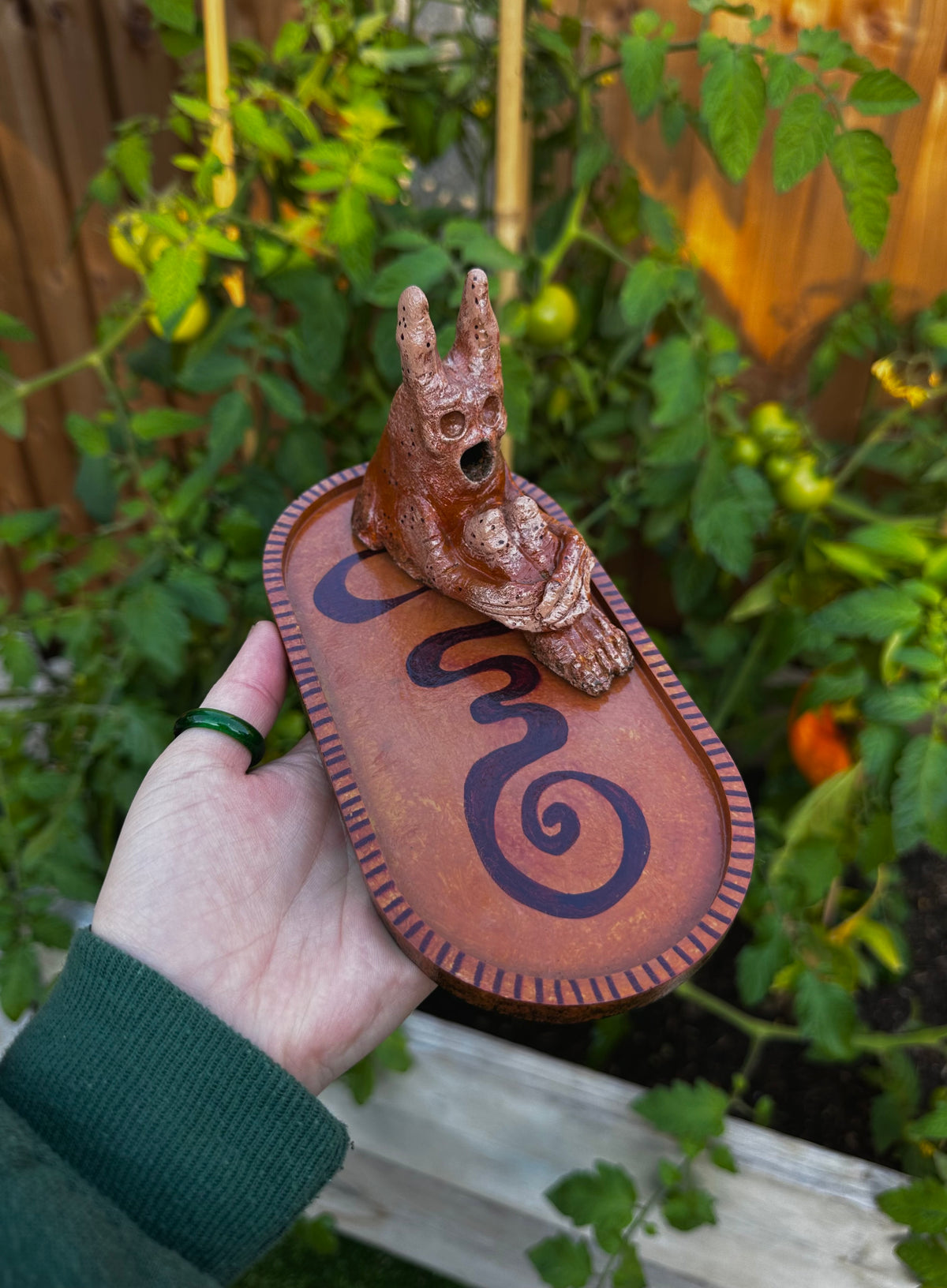 The pondering exhales, incense creature.