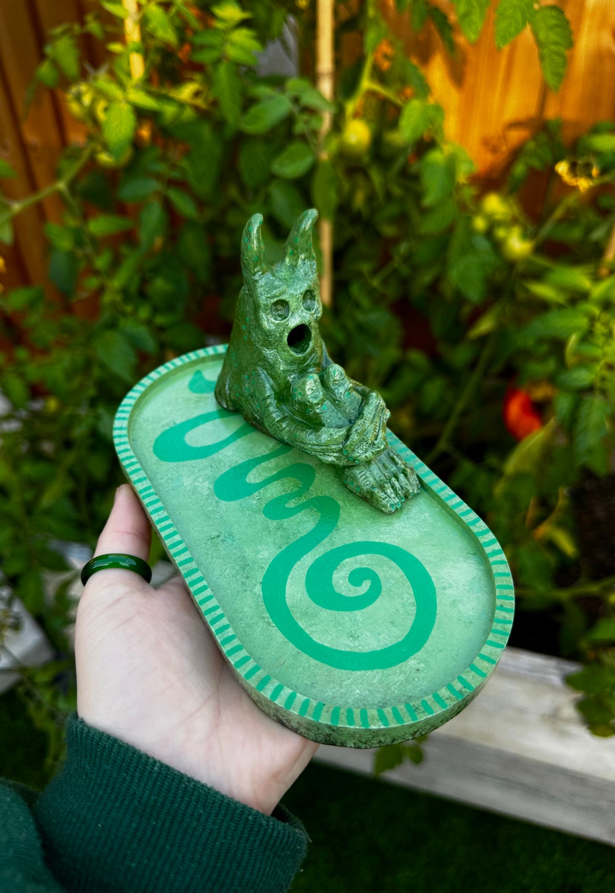 The pondering exhales, incense creature.