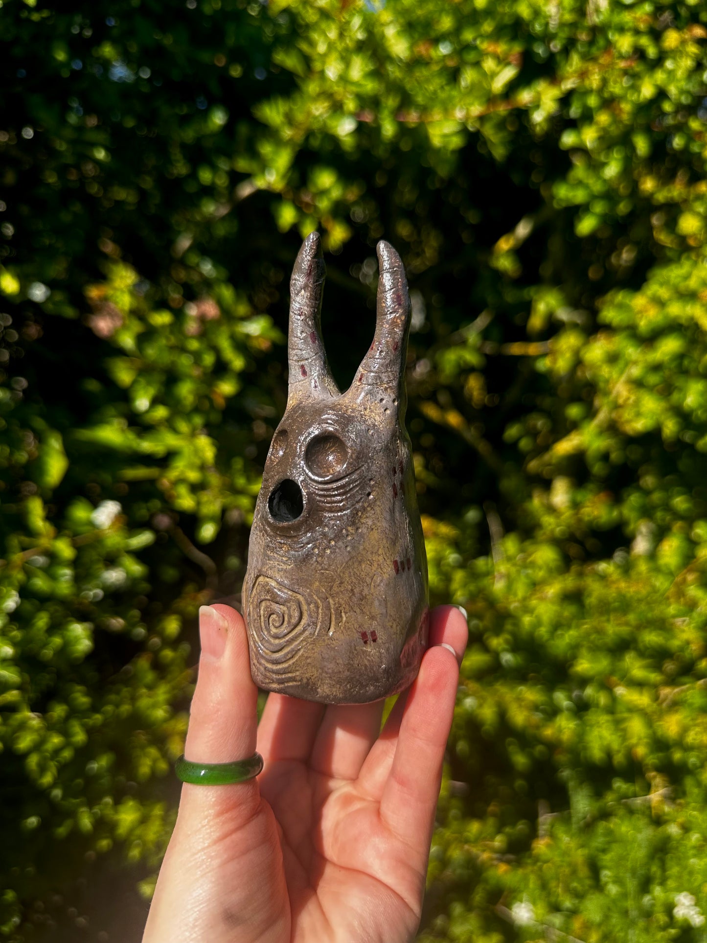 The exhales incense cone cover.