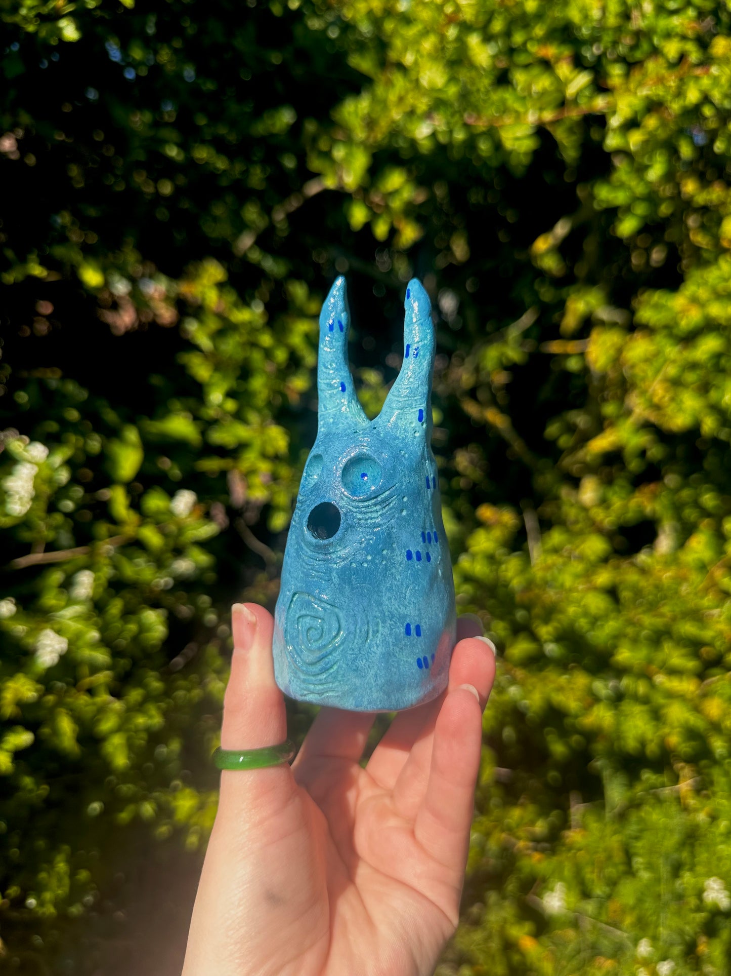 The exhales incense cone cover.