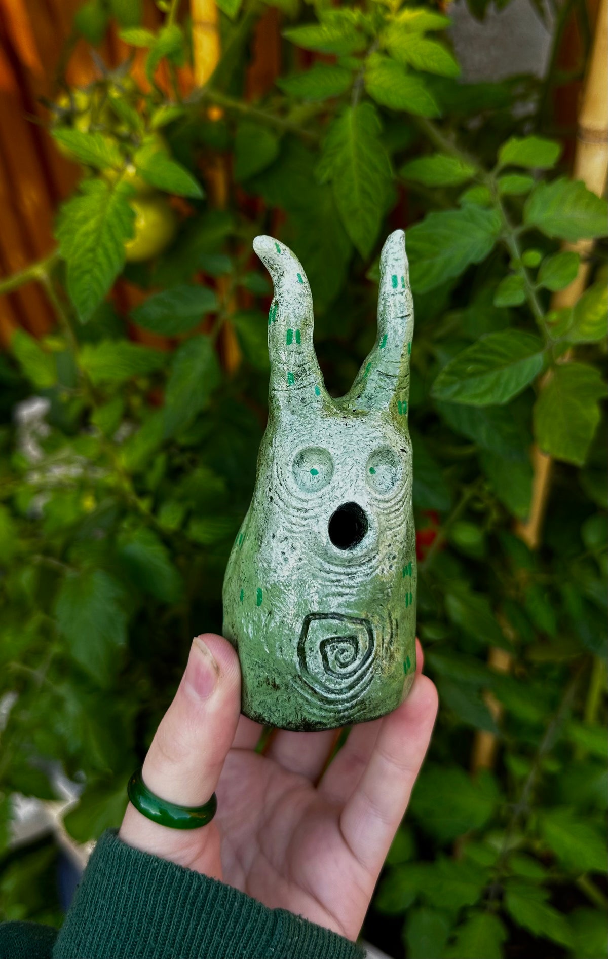 The exhales incense cone cover.