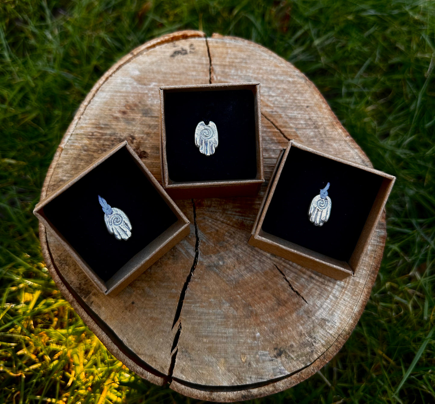 Sterling silver healing hand pendant necklace.
