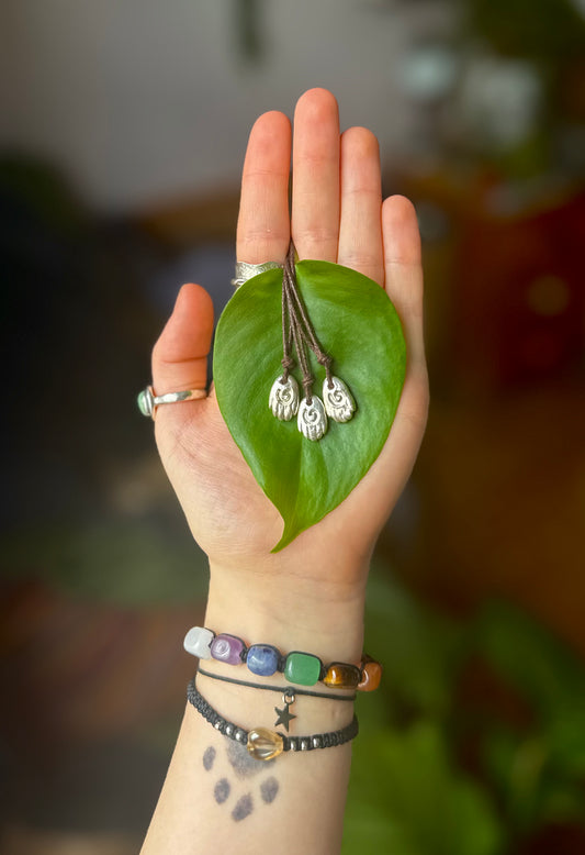 Sterling silver healing hand pendant necklace.