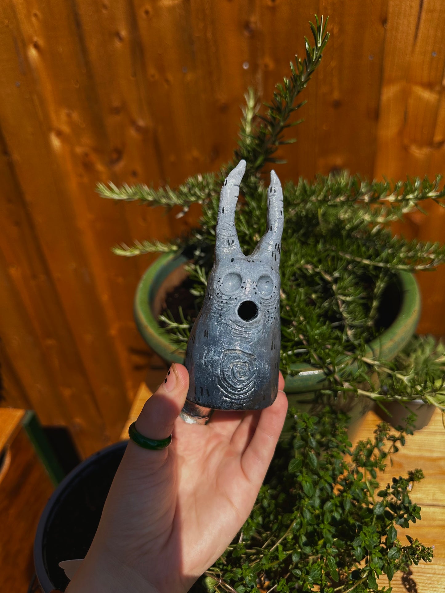 The exhales incense cone cover.