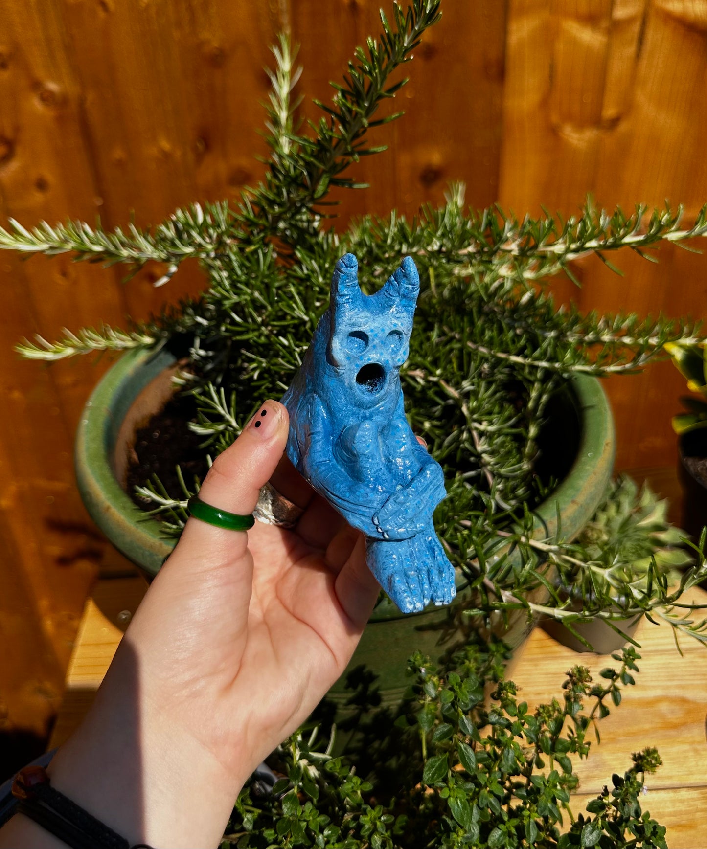 The pondering exhales, incense creature.