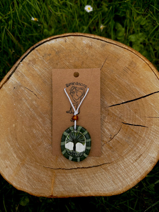 Framed tree pendant necklace.