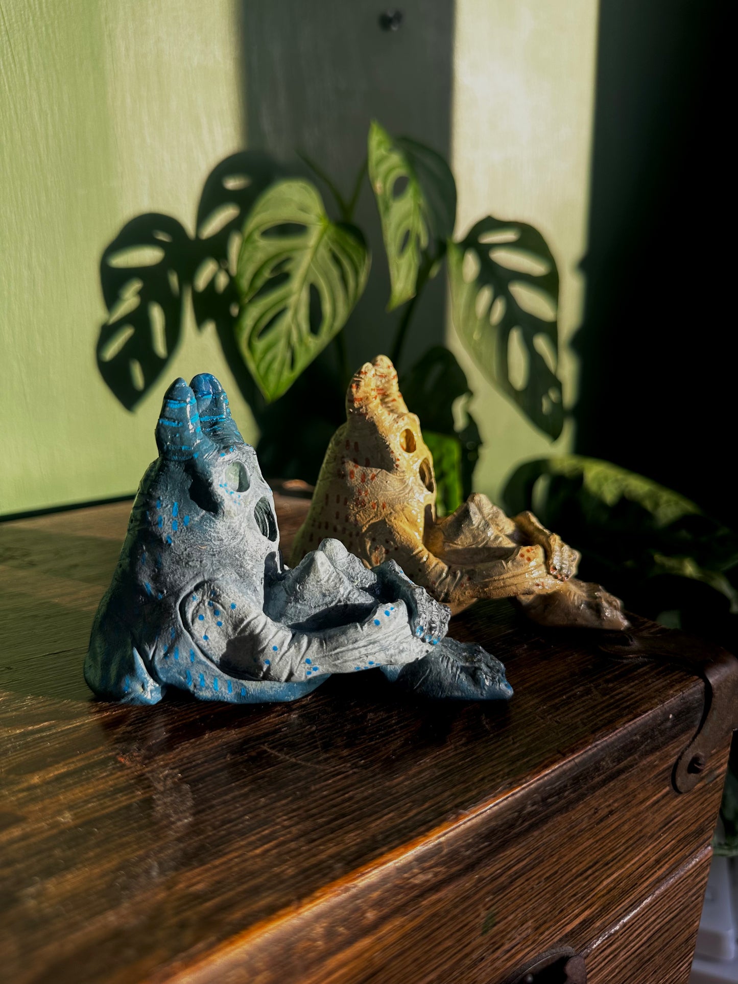 The pondering exhales, incense creature.