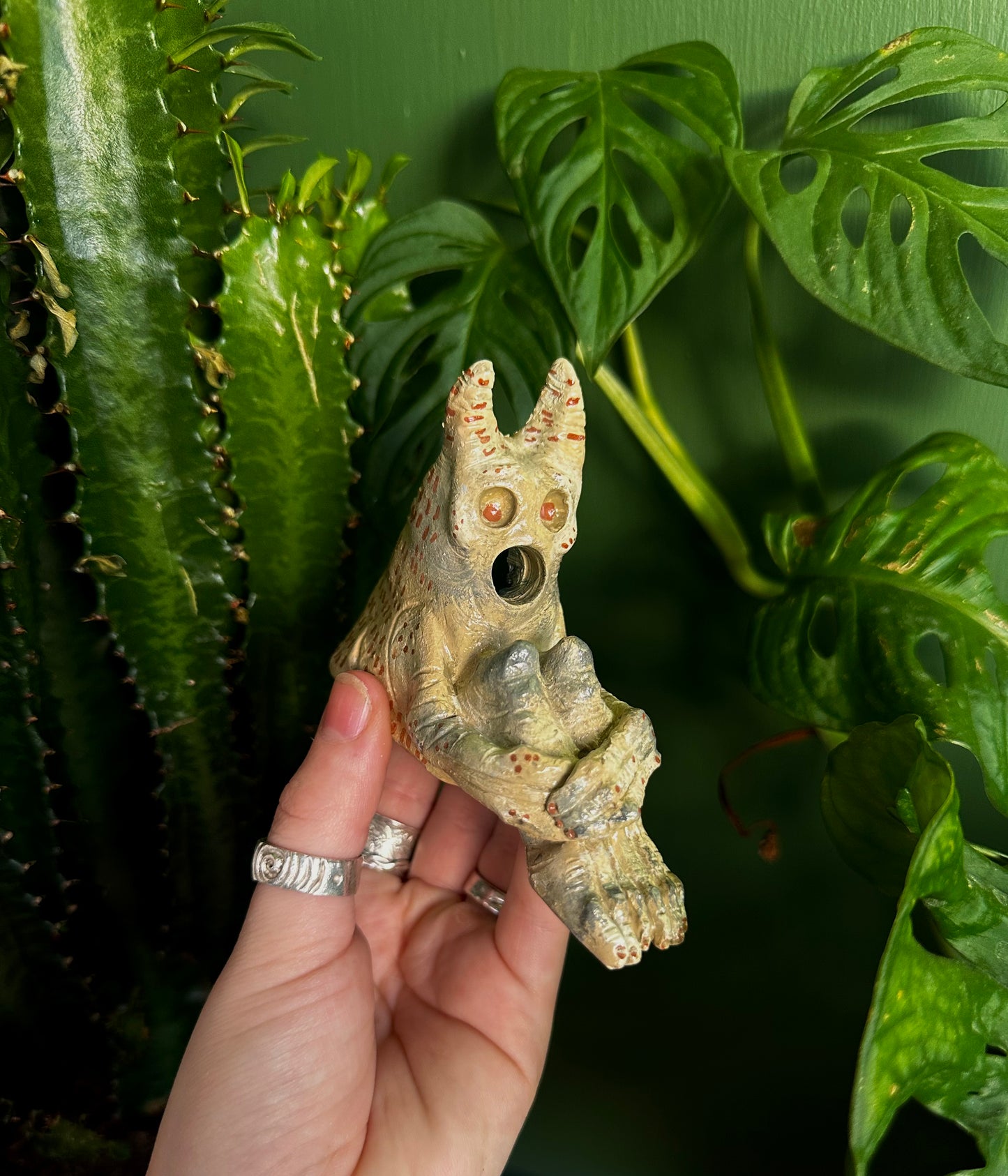 The pondering exhales, incense creature.