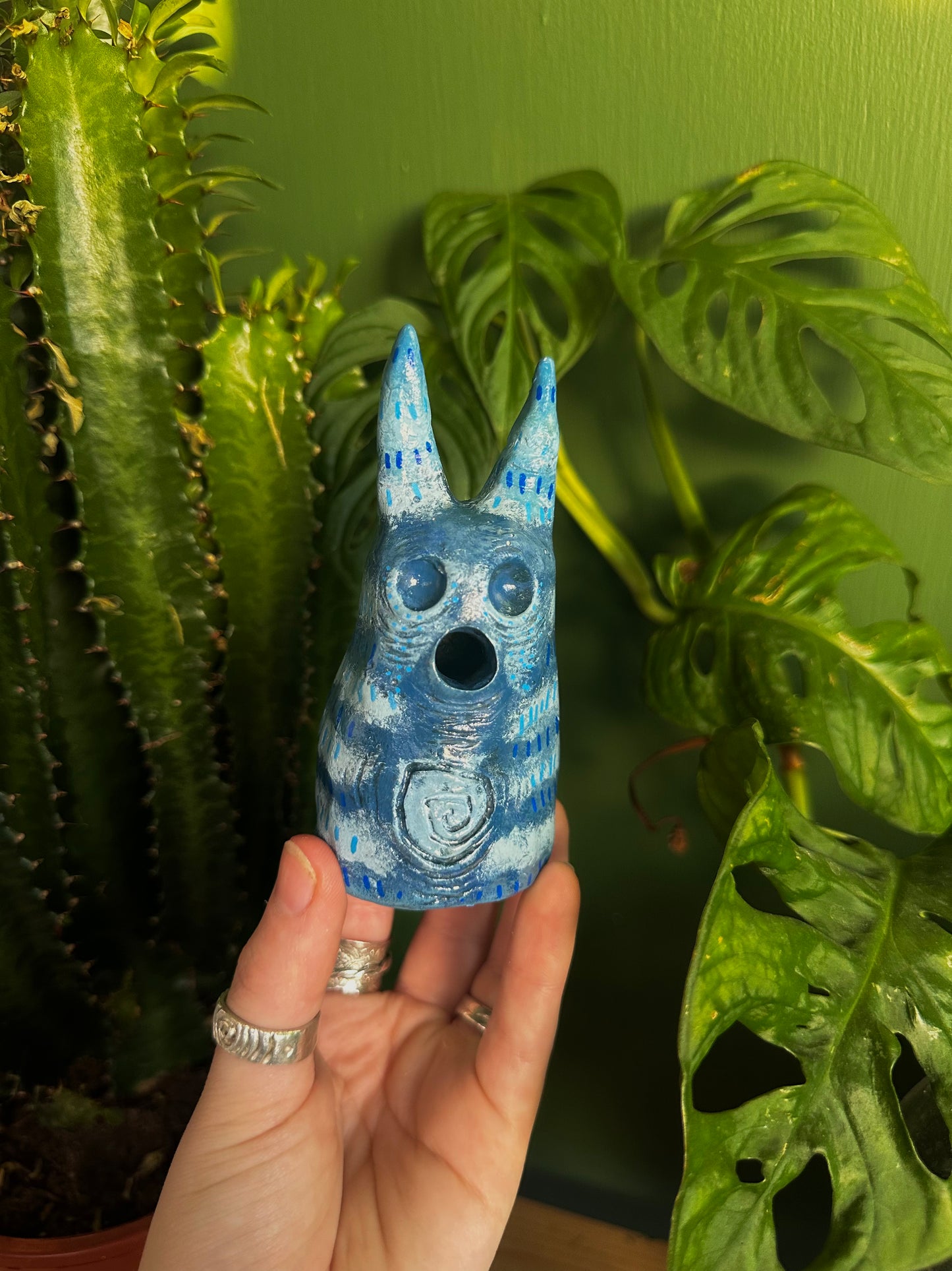 The exhales incense cone cover.