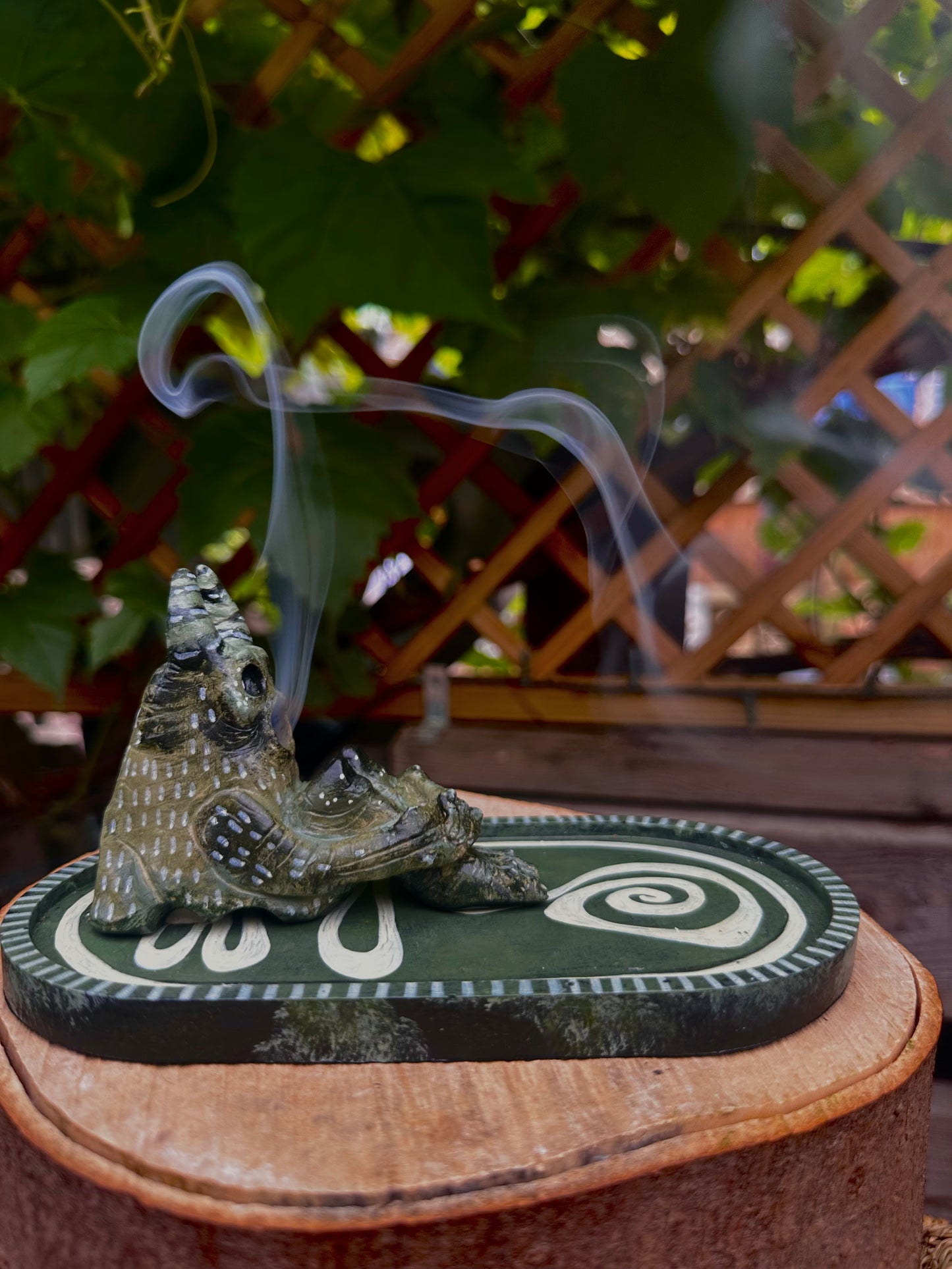 The pondering exhales, incense creature.