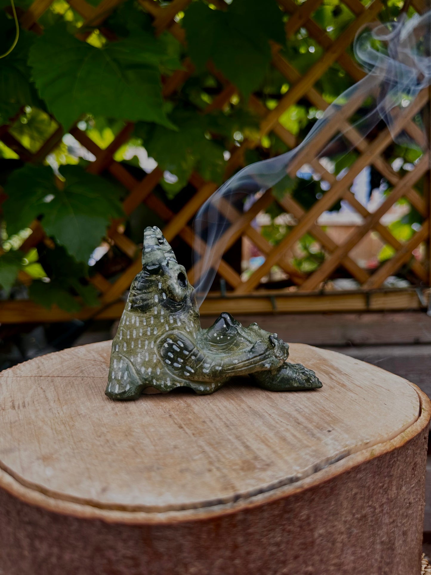 The pondering exhales, incense creature.