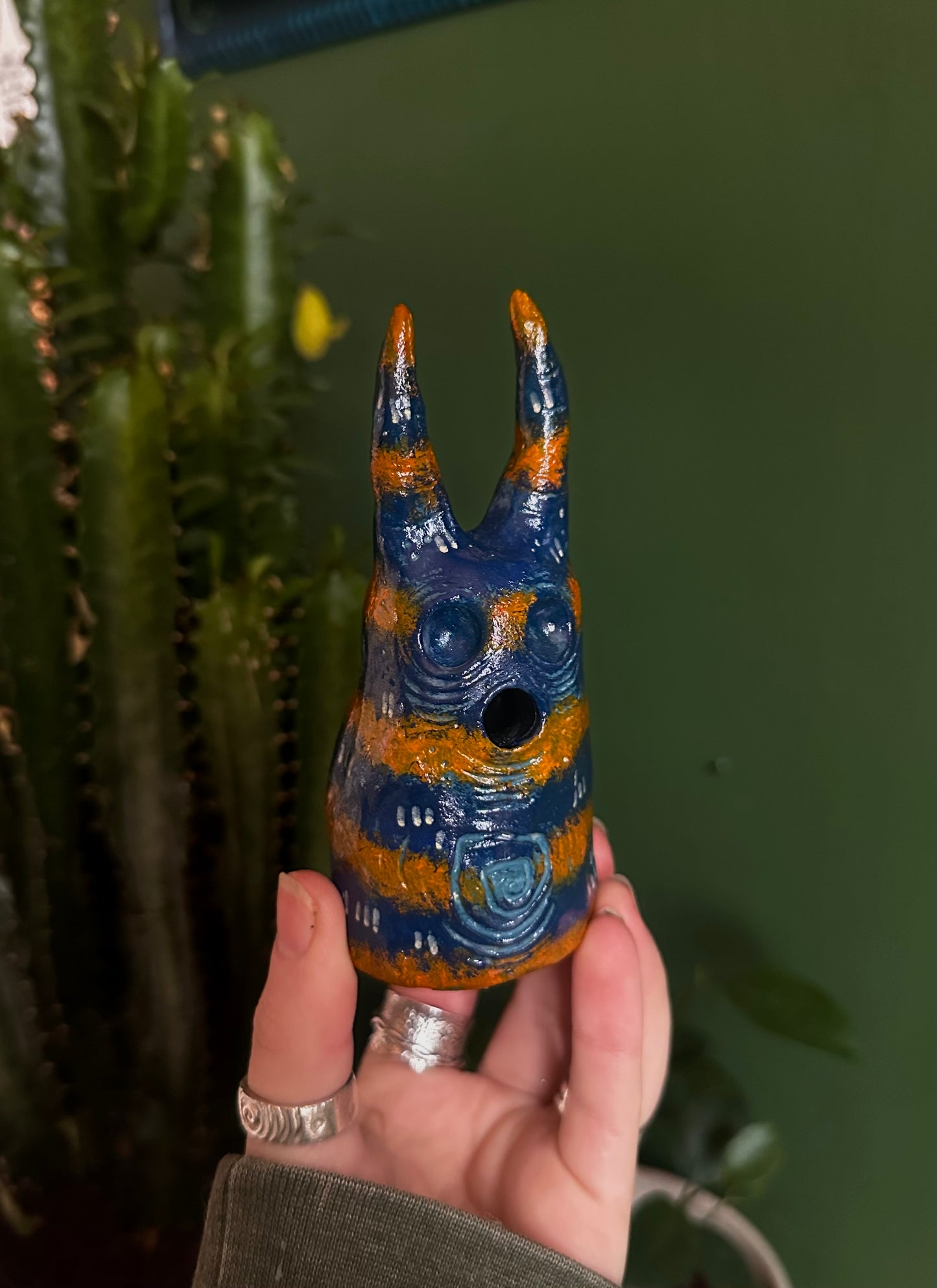 The exhales incense cone cover.