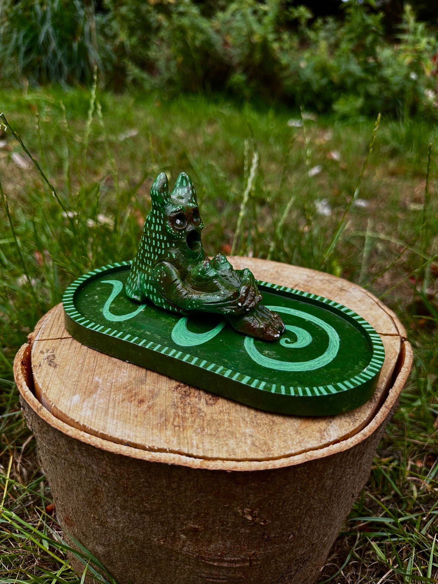 The pondering exhales, incense creature.