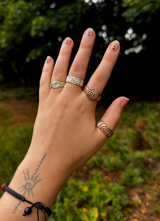 Sterling Silver and copper rings.